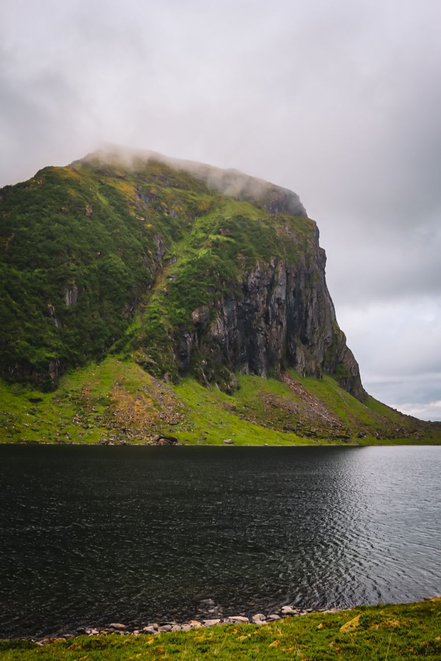 Panoramic view of Scandinavian fjord enveloped in morning mist