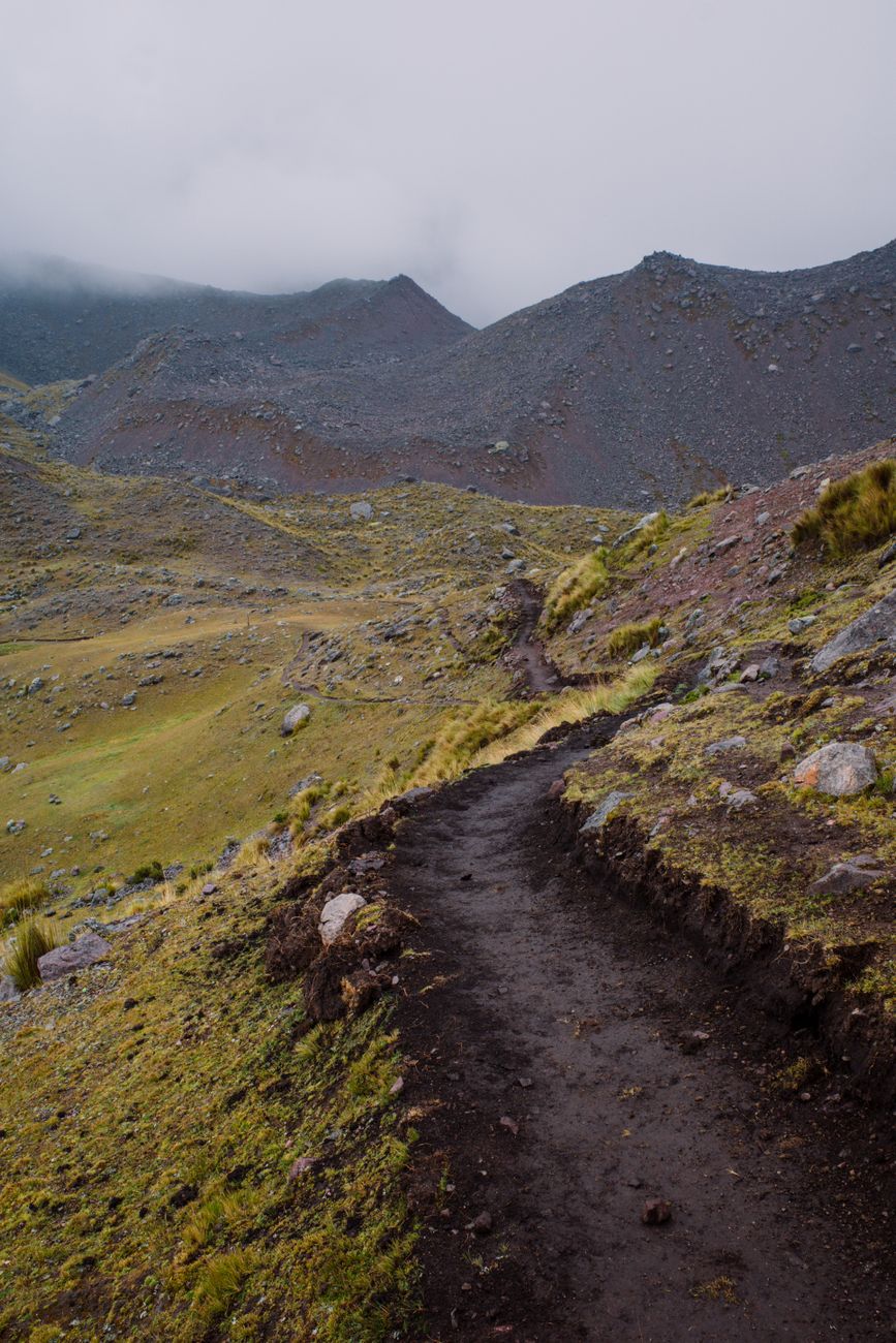 Andes mountain peaks against dramatic clouds